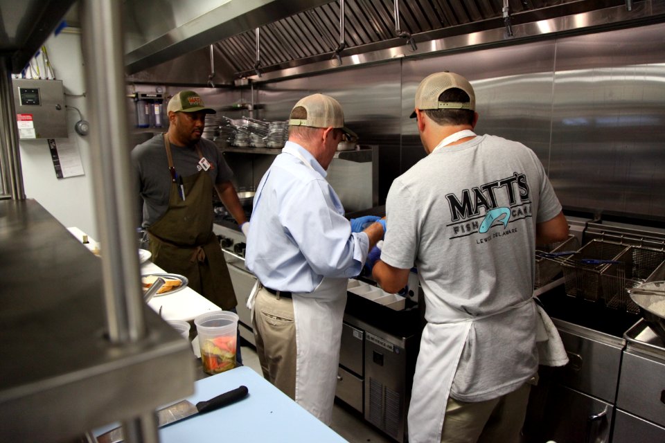 2016-06-16 Senator Coons visits Lewes, DE for the grand opening of Matt's Fish Camp (27637131971)