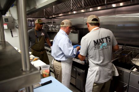2016-06-16 Senator Coons visits Lewes, DE for the grand opening of Matt's Fish Camp (27637131971)