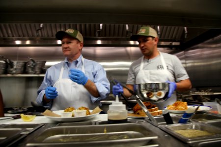 2016-06-16 Senator Coons visits Lewes, DE for the grand opening of Matt's Fish Camp (27711801545)