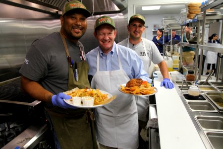 2016-06-16 Senator Coons visits Lewes, DE for the grand opening of Matt's Fish Camp (27099557224)
