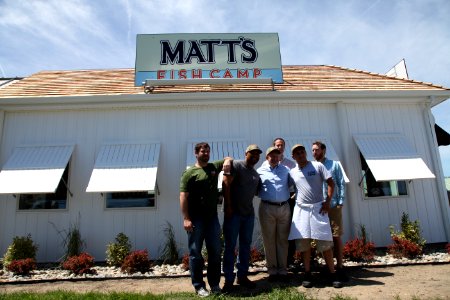 2016-06-16 Senator Coons visits Lewes, DE for the grand opening of Matt's Fish Camp (27101311253)