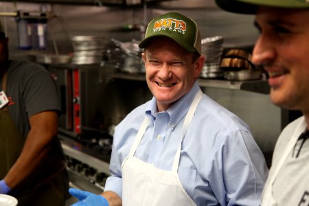 2016-06-16 Senator Coons visits Lewes, DE for the grand opening of Matt's Fish Camp (27433553060)