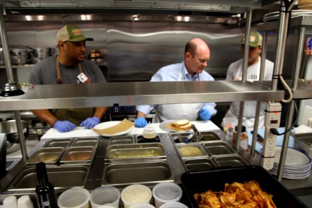 2016-06-16 Senator Coons visits Lewes, DE for the grand opening of Matt's Fish Camp (27711823865)