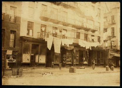 223 E. 107th St., N.Y. Rent sign states that these are 'Eleganti Apartmenti.' License was recently revoked and after that, our investigator found eight families doing home-work there. It is LOC cph.3a31135