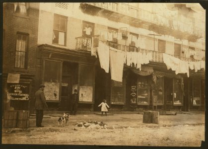 233 E. 107th St., N.Y. Rent sign states that these are 'Eleganti Apartmenti.' License was recently revoked and, after that, our investigator found eight families doing home-work there. It is LOC cph.3b06723