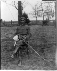 25th anniversary of Tuskegee Inst., Ala., 1906- Young man in uniform seated on lawn LCCN2004668168