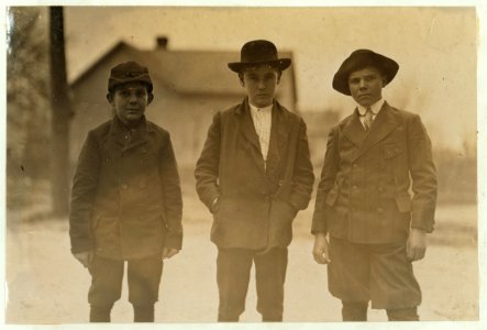 3 doffer boys, Dickson Mill, Laurinburg, N.C. Charley Gregory (boy with white collar). Been in mill 8 years. Has worked nights four years. David and Dick work daytime. Witness, S.R. Hine. LOC nclc.01503