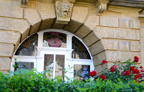 Facade lion head sand stone photo