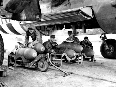 387th Bombardment Group - Loading bombs in B-26 Marauder on D-Day photo