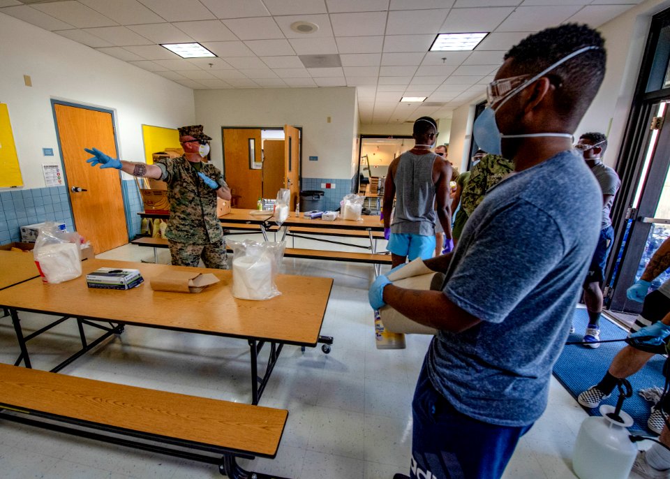 3rd Medical Battalion Corpsman sanitize facility for USS Theodore Roosevelt Sailors (49774743292)