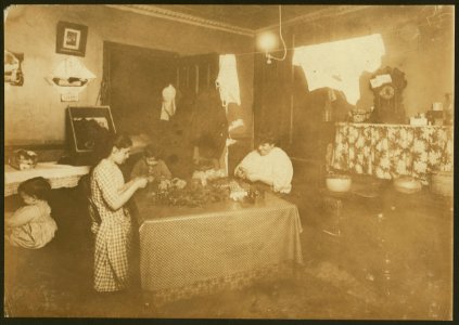 4-30 P.M. Flora Anseline, a busy girl. 5 Carmine St., N.Y. She goes to school, helps mother with housework, and makes flowers, working some nights until 10 P.M. The little boy helps some. LOC nclc.04127