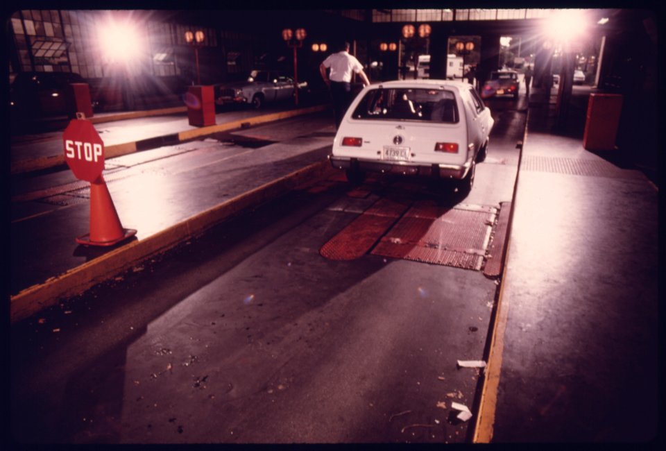 5Car That Has Just Been through an Exhaust Analyzer Test for Carbon Monoxide and Hydrocarbon Emissions Continues Down the Safety Lane in an Auto Emission Inspection Station in Downtown Cincinnati, Ohio...08-1975 (4265788821)