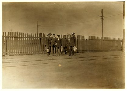 6 A. M., June 9, 1909. I found only a few youngsters going into this mill. American Thread Co., Westerly, R.I. LOC nclc.01815