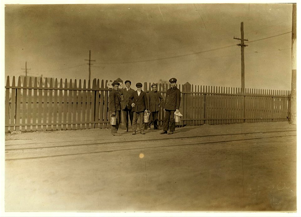 6 A. M., June 9, 1909. I found only a few youngsters going into this mill. American Thread Co., Westerly, R.I. LOC nclc.01815