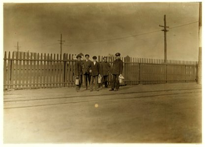 6 A. M., June 9, 1909. I found only a few youngsters going into this mill. American Thread Co., Westerly, R.I. LOC nclc.01815