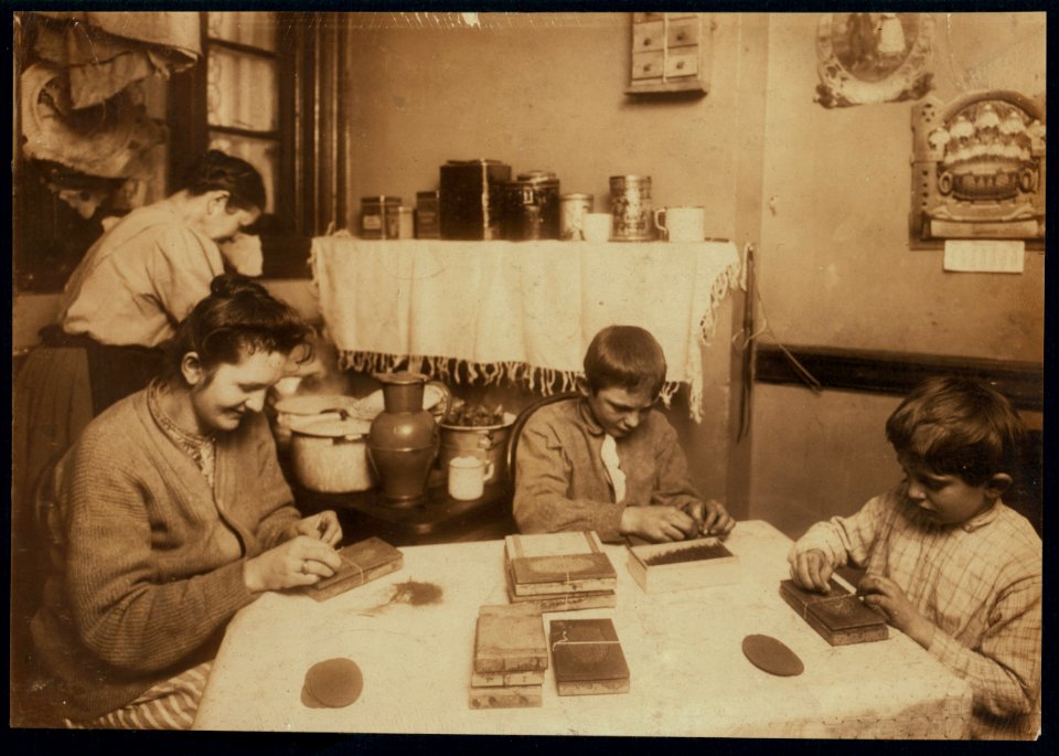 6 P.M. Making hair-brushes. Hausner family, 310 E. 71 St., N.Y. Frank is 6 yrs old. and John is 12. The mother had a sore throat and wore a great rag rapped around it, but she took it off LOC nclc.05488