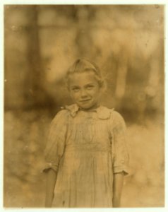 7-year old Rosie. Regular shucker. Her second year at it. Illiterate. Works all day. Shucks only a few pots a day. Varn & Platt Canning Co. LOC nclc.01012 photo