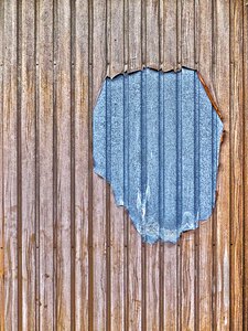 Damaged wood pattern metal gate photo