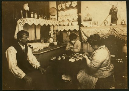 8-00 P.M. January 29, 1912. Cardinale family making silk flowers. Father wears a cast. Does not work. (See report on schedule.) Boy, 11 years old, helps some, even at night. 43 Carmine St., LOC nclc.04138