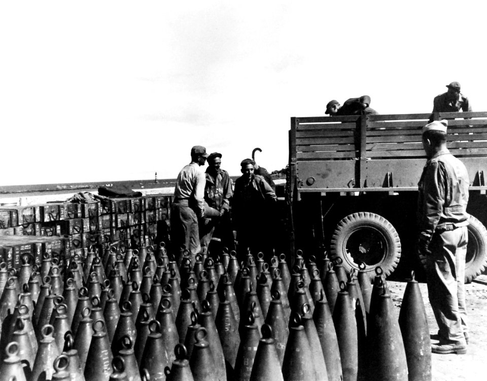 80-G-247135 US Navy Seabees loading ammunition at Roscoff