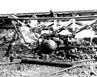 80-G-257404 , German mines lashed to railroad causeway