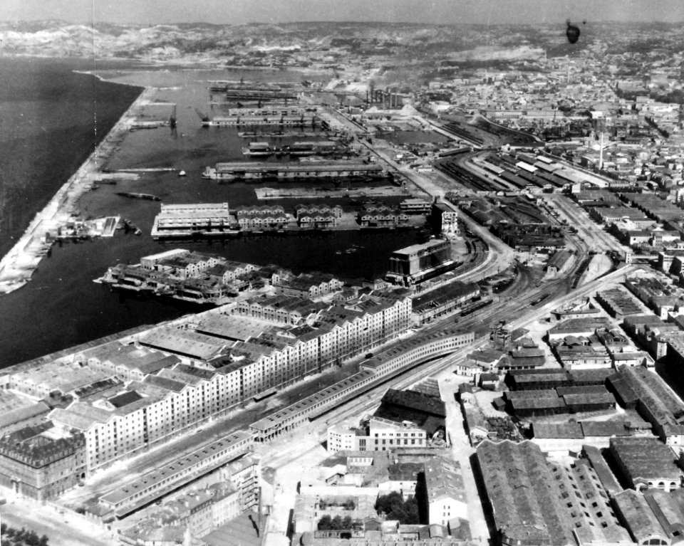 80-G-364052 Aerial view of the destruction to the harbor and installations at Marseille, France