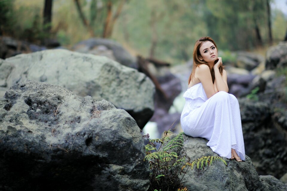 White dress green leaves river