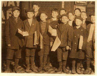 9-00 P.M. Group of young newsboys and venders selling late at night. Some of them were selling in saloons at that time. May 7, 1910. Witness E.N. Clopper. LOC nclc.03471 photo