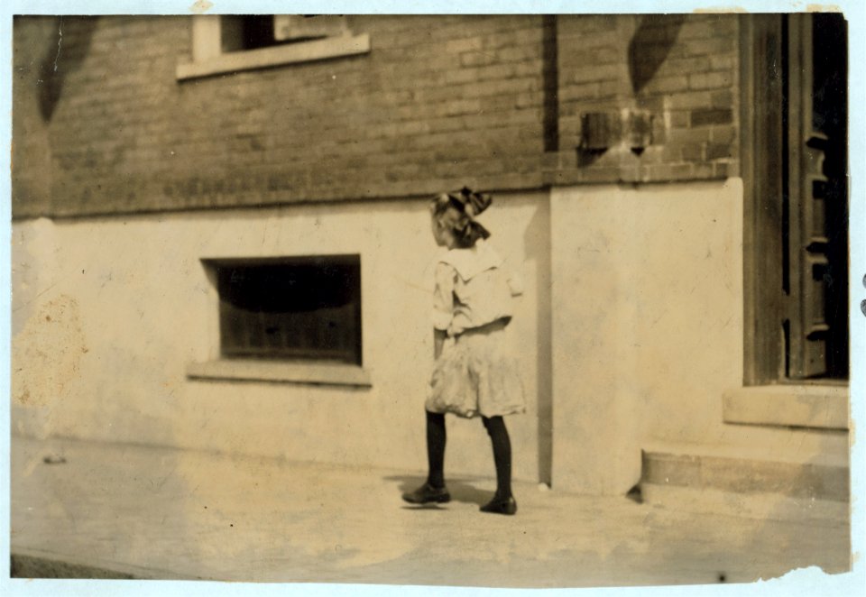 9 year old cash girl in Gafer Department store. At first glance the home conditions with a one-armed father and several children in the family would indicate that her small wages were LOC nclc.04978