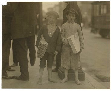 9 year old newsie and his 7 year old brother 'Red.' Tough specimen of Los Angeles newsboys. See California report. LOC nclc.03962
