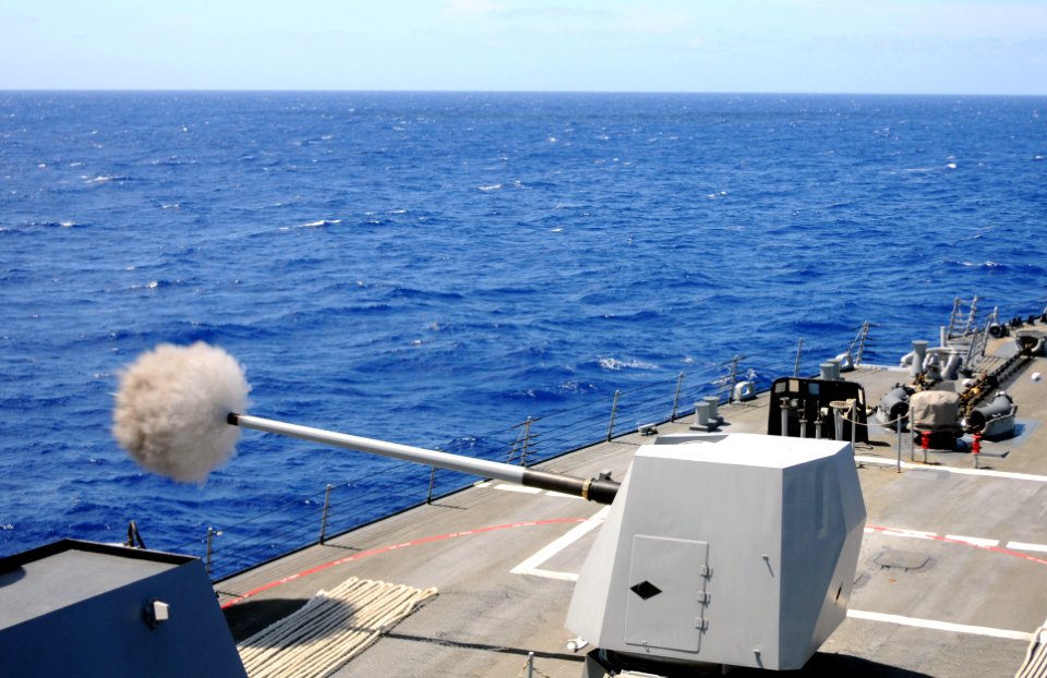 A 5-inch gun fires aboard USS Winston S. Churchill. (8594719701)