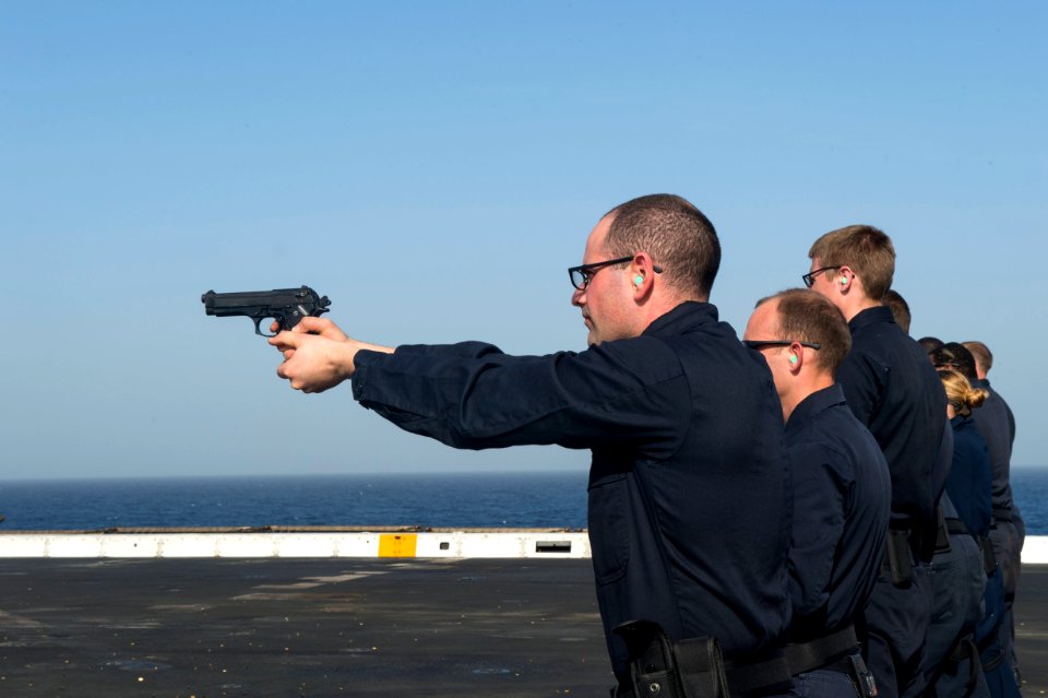 9mm handgun live-fire exercise 150120-N-IK388-041