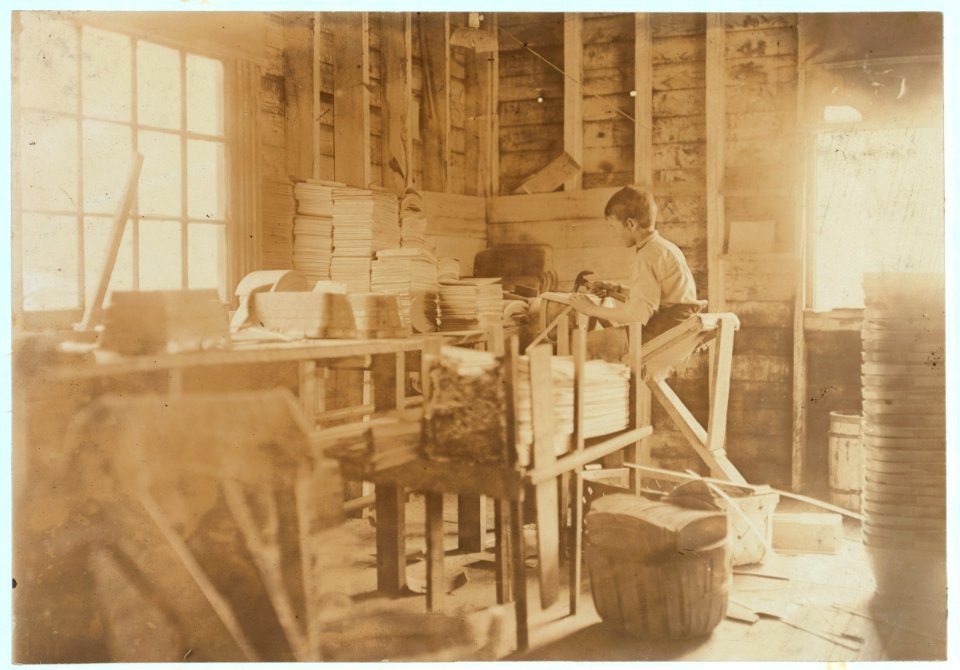 A Basket Factory, Evansville, Indiana. Boy Making Melon Baskets. LOC nclc.04483