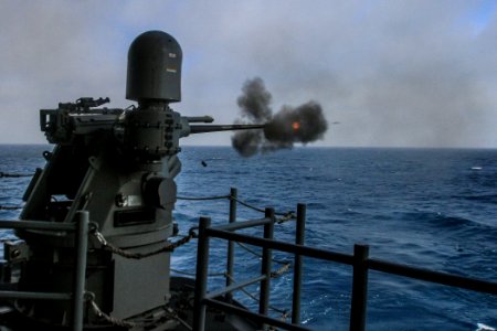 A 25 mm remote machine gun fires aboard USS Boxer. (8599729575) photo