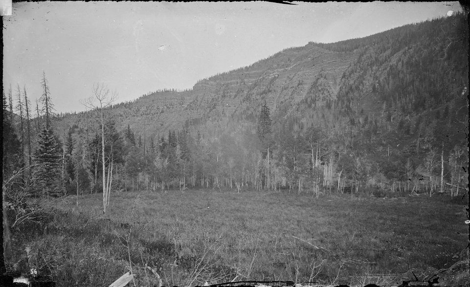 A bluff of Paleozoic sandstones, 1,500 feet in height, on Eagle River. Colorado. - NARA - 517027