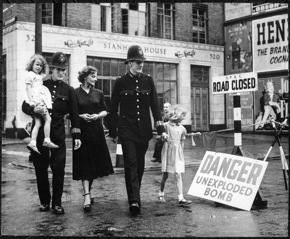 A 2,500 pound German bomb, buried opposite University College Hospital, London, was removed by Army sappers. Before... - NARA - 541903