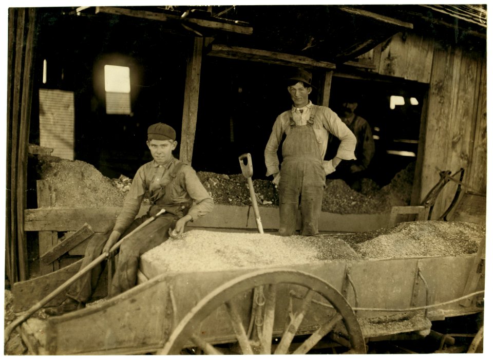 A Boy (may be over 14) at Heavy Work. Shoveling Ore at Daisy Bell Mine, Aurora, Mo.,. LOC nclc.01089