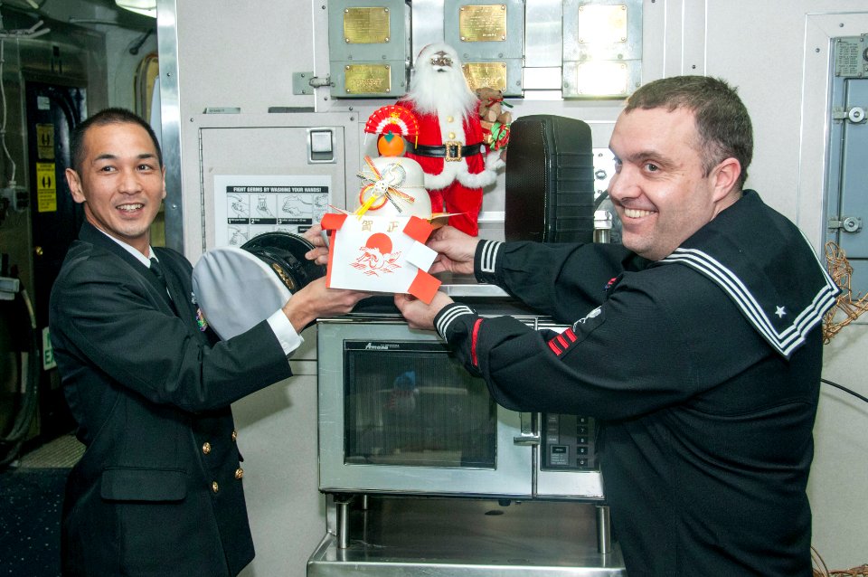 A bilateral gift exchange 151218-N-RU971-438