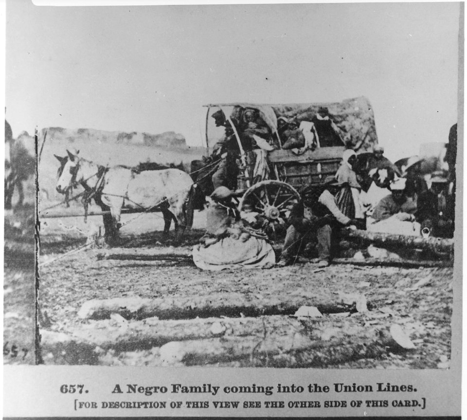 A black family entering Union lines with a loaded cart - NARA - 559271