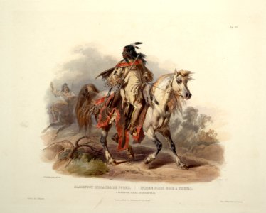 A Blackfoot indian on horseback 0019v photo