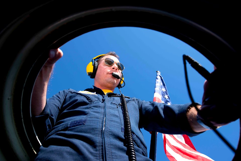 A Blue Angels Marine does a safety check on Fat Albert. (8232063973)