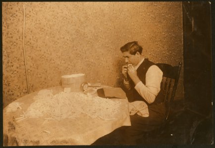 A common occurrence, licking the paper when making cigarette cases. (For complete details see Miss E.C. Watson's report.) LOC nclc.04301
