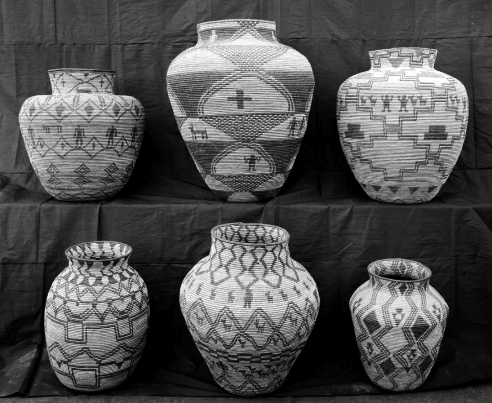 A collection of Apache Indian baskets (ollas) on display, ca.1900 (CHS-3555)