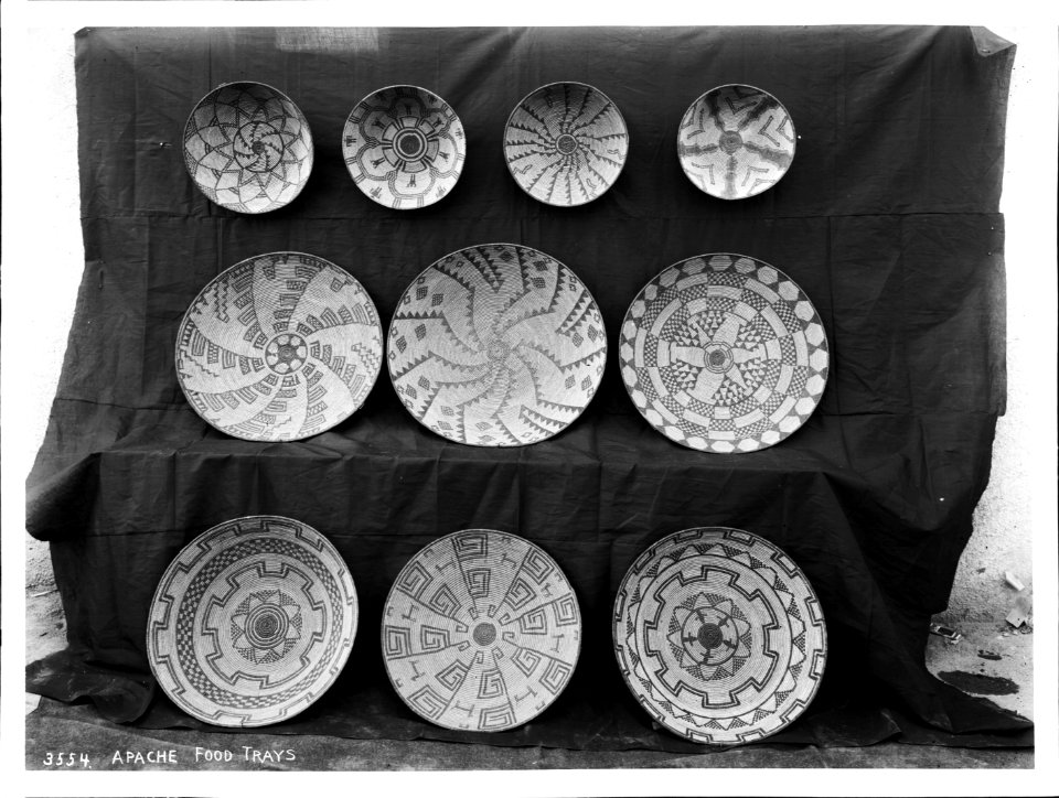 A collection of Apache Indian baskets (food trays) on display, ca.1900 (CHS-3554)
