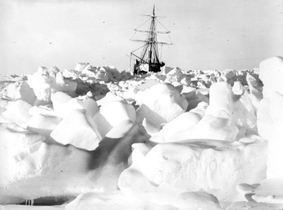 A distant bow view of 'Endurance' (1912) frozen into the ice floe RMG P00016