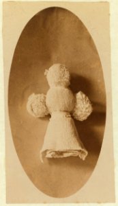 A doll made by one of the 5 year old children that plays in knitting mill where mother works. Made from waste material. These children help sister and mother ravel. LOC nclc.05385 photo