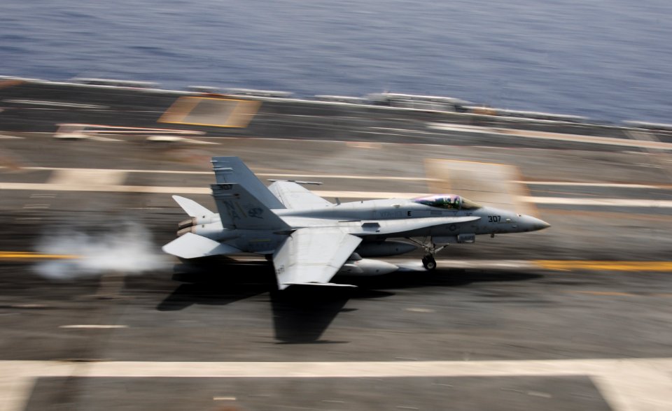 A F A-18C Hornet lands aboard USS Carl Vinson. (8718535826)
