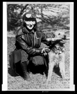 A female aviator with Warren Harding's pet dog Laddie Boy LCCN2005677277
