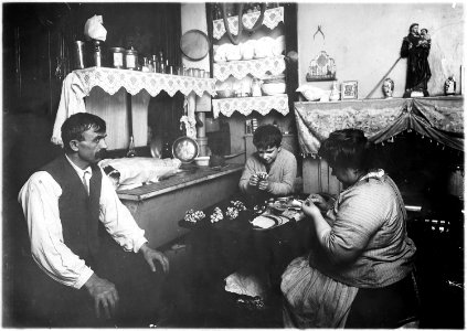 A family making silk flowers. Father wears a cast. Does not work. Boy, 11 years old, helps some. New York City. - NARA - 523516