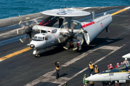 A French Navy E-2C Hawkeye aircraft assigned to the French aircraft carrier Charles de Gaulle (R 91) taxis on the aircraft carrier USS Harry S. Truman (CVN 75) during carrier qualification integration in 140114-N-ZG705-232